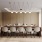 long table with chairs in large clubhouse with stylish lighting