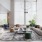 vast clubhouse with chandelier, couches and bright, natural lighting