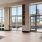 natural lighting floods spacious clubhouse through tall windows