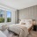 Bedroom with large windows